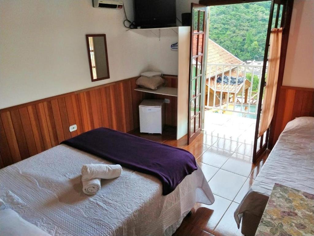 Araucária Suítes Pensión